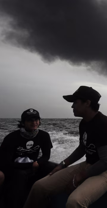 Image: Members of the marine wildlife conservation organization Sea Shepherd monitor the fuel tanker Burgos as it burns