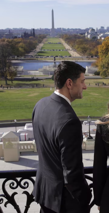 Image: Speaker of the House Paul Ryan shows Melania Trump and U.S. President-elect Donald Trump the Mall in Washington.