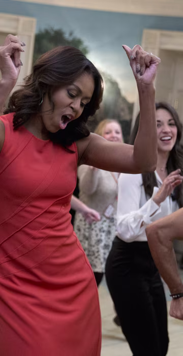 Image: Michelle Obama, Josh Segarra, Sergio Trujillo