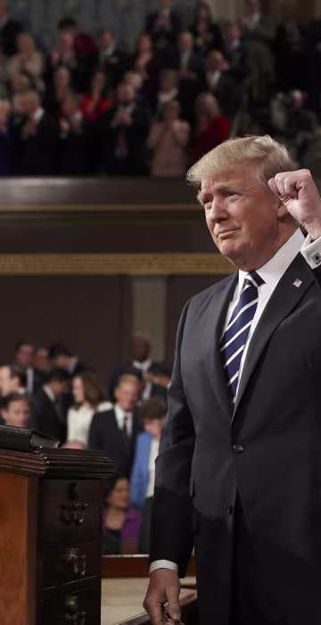 Image: US President Donald J. Trump arrives to deliver his first address to a joint session of Congress from the floor of the House of Representatives in Washington