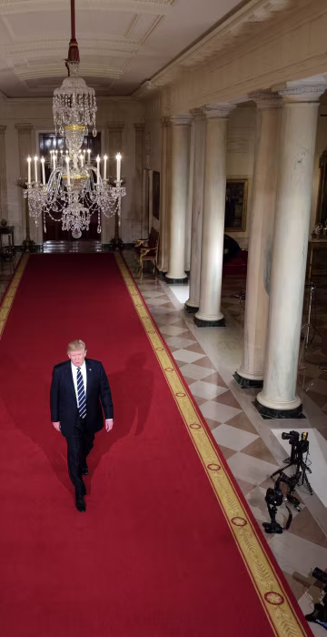 Image: President Donald Trump walks through the Cross Hall to the East Room to nominate Neil M. Gorsuch