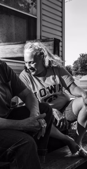 Image: Elizabeth Bemer (left) and her daughter Diana Bemer (right), sit on their steps as they talk about Trump.