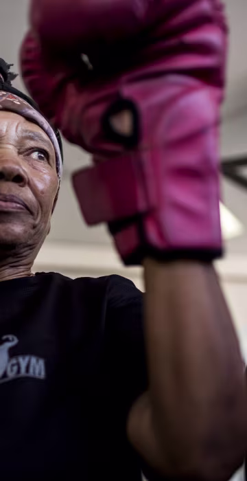 Image: Gladys Ngwenya, 77,prepares to box