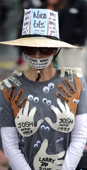 Image: Woman at protest for sexual assault victims and supporters