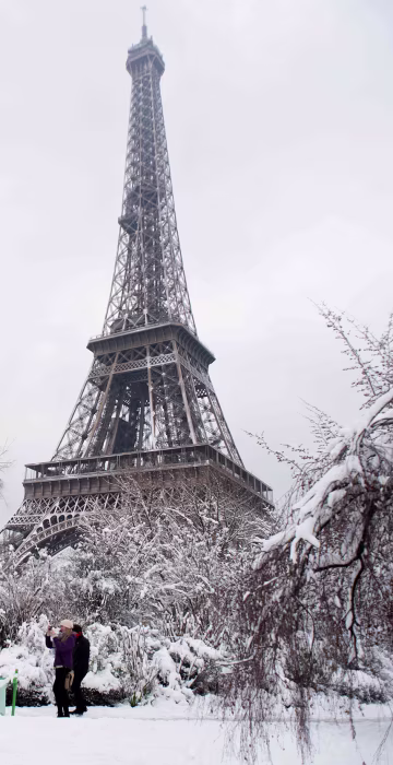 People walk through the Champ de Mars garden on Feb. 7.