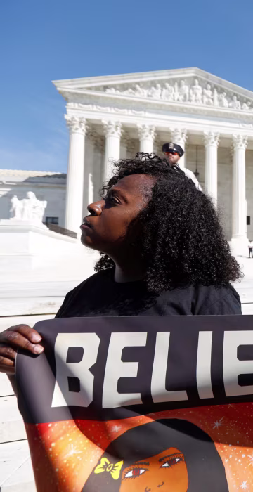 Image: Activists hold a protest march and rally in opposition to U.S. Supreme Court nominee Brett Kavanaugh in Washington