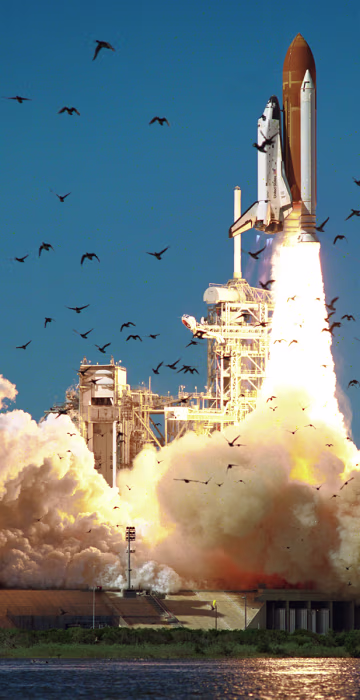 Image: A wide-angle view shows the ascent of the shuttle Challenger