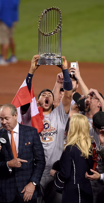 Image: Carlos Correa of the Houston Astros hoists the trophy after defeating the Los Angeles Dodgers to win the 2017 World Series at Dodger Stadium on November 1, 2017 in Los Angeles.