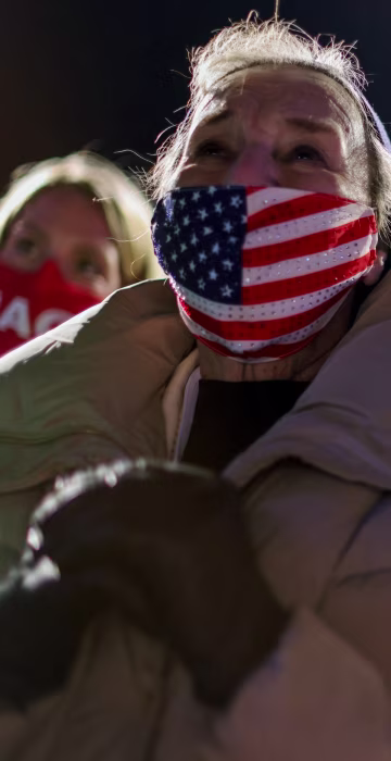 Image: People attend a campaign event by U.S. President Donald Trump in Omaha, Nebraska