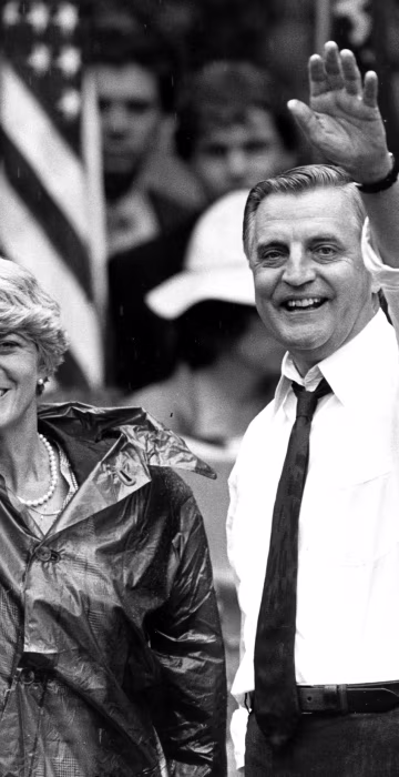 FILE - In this Wednesday, Sept. 5, 1984, file photo, Democratic presidential candidate Walter Mondale and his running mate, Geraldine Ferraro, wave as they leave an afternoon rally in Portland, Ore. Mondale, a liberal icon who lost the most lopsided presidential election after bluntly telling voters to expect a tax increase if he won, died Monday, April 19, 2021. He was 93. (AP Photo/Jack Smith, File)