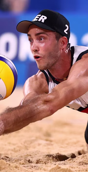 Germany's Clemens Wickler goes to bump the volleyball during a match against Italy at the Olympics in Tokyo on July 25, 2021.