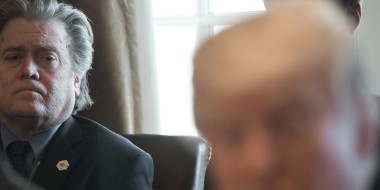 Image: Steve Bannon listens as President Donald Trump speaks to the media