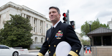 Image: Ronny Jackson walks on Capitol Hill following a meeting