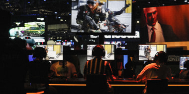 Image: Attendees play the Activision Blizzard game \"Call of Duty: Black Ops 4\" at the E3 Electronic Entertainment Expo in Los Angeles in 2018.