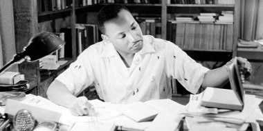 Reverend Martin Luther King, Jr. relaxes at home in May 1956 in Montgomery, AL.