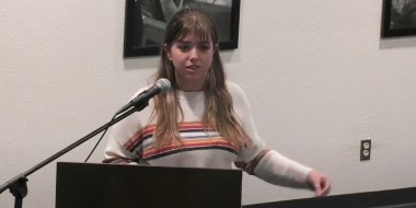 Image: A student speaks at a Granbury ISD school board meeting about banned books.