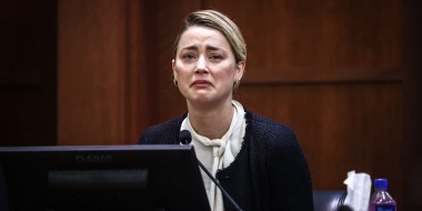 Image: Amber Heard testifies at the Fairfax County Circuit Courthouse in Fairfax, Va., on May 5, 2022.