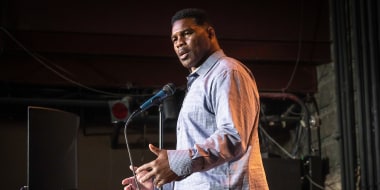 Heisman Trophy winner and Republican candidate for Senate Herschel Walker speaks at a rally on May 23, 2022 in Athens, Ga.