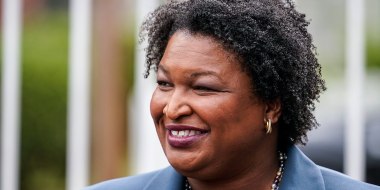 Image: Georgia Democratic gubernatorial candidate Stacey Abrams talks to the media during Georgia's primary election on May 24, 2022, in Atlanta.