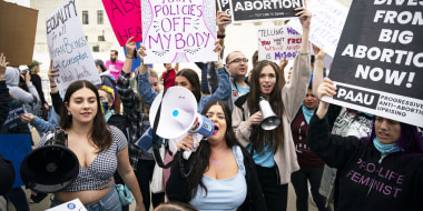 Anti-abortion and abortion rights demonstrators protest