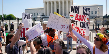 Abortion rights demonstrators protest outside the Supreme Court
