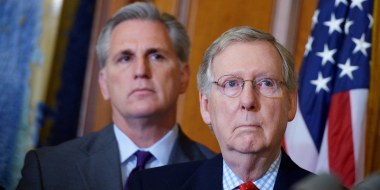 Senate Majority Leader Mitch McConnell stands next to House Majority Leader Kevin McCarthy during a signing ceremony for the Keystone XL Pipeline Approval Act on February 13, 2015 in the Rayburn Room of the US Capitol in Washington, DC.