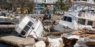 Boats lie in ruin in the marina by Joe’s Crab Shack from the destruction of Hurricane Ian in Fort Myers, Fla. on Sept. 30, 2022.