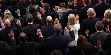 Newly elected Speaker of the US House of Representatives Kevin McCarthy (off frame) swears in the members of the 118th Congress at the US Capitol in Washington, DC, on January 7, 2023. - Kevin McCarthy's election to his dream job of speaker of the US House of Representatives was secured through a mix of bombproof ambition, a talent for cutting deals and a proven track record of getting Republicans what they need.
He only won election as speaker after they forced him to endure 15 rounds of voting -- a torrid spectacle unseen in the US Capitol since 1859. (Photo by OLIVIER DOULIERY / AFP) (Photo by OLIVIER DOULIERY/AFP via Getty Images)