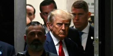 Donald Trump makes his way inside the Manhattan Criminal Courthouse in New York on April 4, 2023.