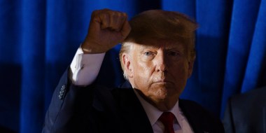 Image: Former President Donald Trump raises his fists at supporters following a rally campaigning for the GOP presidential nomination, in Manchester, N.H. on April 27, 2023. (Sophie Park/The New York Times)