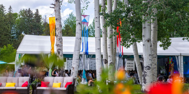 A packed discussion in the East Lawn Tent overflows onto the lawn at Aspen Ideas Festival on Thursday, June 29, 2023.