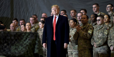 Image: Then-President Donald Trump speaks to the troops