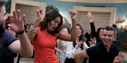 Image: Michelle Obama, Josh Segarra, Sergio Trujillo