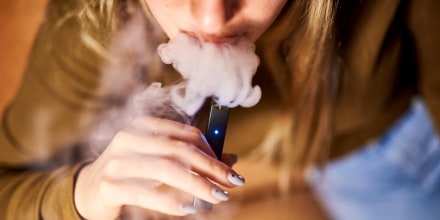 Image: A person smokes a Juul e-cigarette in Brooklyn, New York, on Dec. 20, 2018.