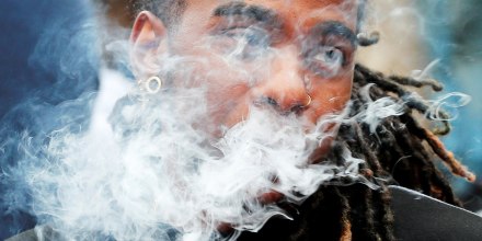 Image: FILE PHOTO: A demonstrator vapes during a protest in Boston
