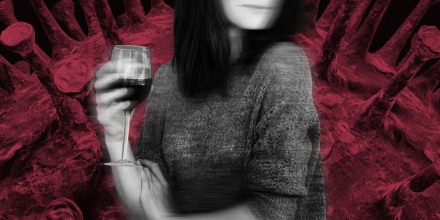 Image: A woman, semi-blurry, drinking red wine as a giant coronavirus spore looms in the background.
