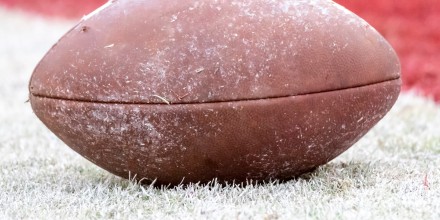 A football on the field in Stanford Stadium prior to an NCAA football game between the Notre Dame Fighting Irish and the Stanford Cardinal in Palo Alto on Nov. 30, 2019.