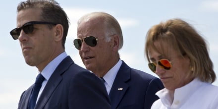 Image: U.S. Vice President Joe Biden, centre, his son Hunter Biden, left, and his sister Valerie Biden Owens, right, joined by other family members during a ceremony to name a national road after his late son in the village of Sojevo, Kosovo.