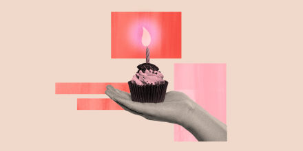 Image: Illustration of hand holding a cupcake with birthday candle