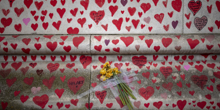 Image: Daffodils are taped to the National Covid Memorial Wall on April 21, 2021 in London.