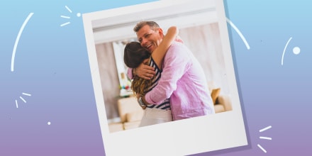 Woman hugging a man in a living room