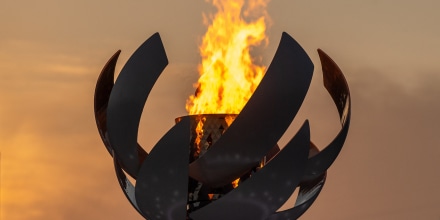 The Olympic flame burning on the cauldron at Ariake Yume-no-Ohashi Bridge in Tokyo.