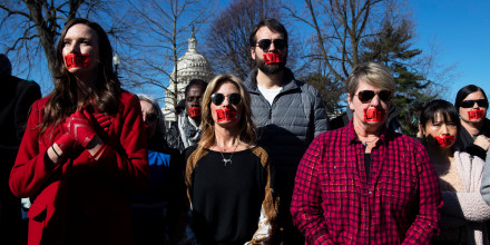 Anti-abortion activists protest outside the Supreme Court in Washington on March 4, 2020.