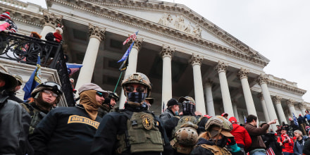 Image: Members of the Oath Keepers on the east front steps of the U.S. Capitol on Jan. 6, 2021.