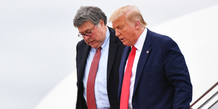 Donald Trump and US Attorney General William Barr exit Air Force One upon arrival at Andrews Air Force Base in Maryland on September 1, 2020.