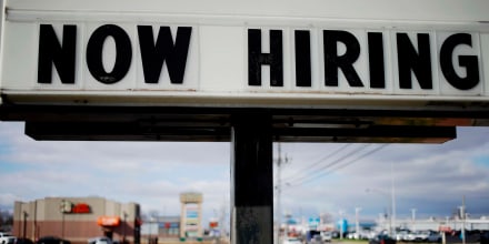 A 'Now Hiring' sign outside a Subway restaurant in Seymour, Ind. on Dec. 6, 2021.