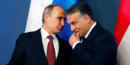 Image: Russian President Vladimir Putin discuss with Hungarian Prime Minister Viktor Orban before a joint news conference in Budapest on Feb. 17, 2015.