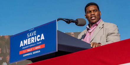 Former Heisman Trophy winner and candidate for US Senate Herschel Walker speaks to supporters of Donald Trump during a on March 26 in Commerce, Ga.