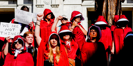 Protesters dressed in "The Handmaid's Tale" costumes stand outside the Louisiana Supreme Court in the French Quarter of New Orleans, La. on May 25, 2019, to protest the proposed Heartbeat Bill that would ban abortion after 6 weeks.
