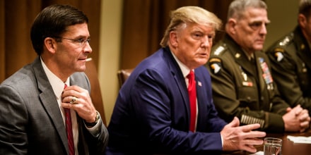 Secretary of Defense Mark Esper, left, President Donald Trump, and Chairman of the Joint Chiefs of Staff Army Gen. Mark A. Milley, right, wait for a meeting with senior military leaders in the Cabinet Room of the White House on Oct. 7, 2019.